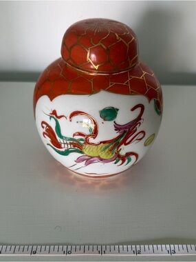 Vintage Decorative Red and White Porcelain Ginger Jar with Hand-Painted Motif